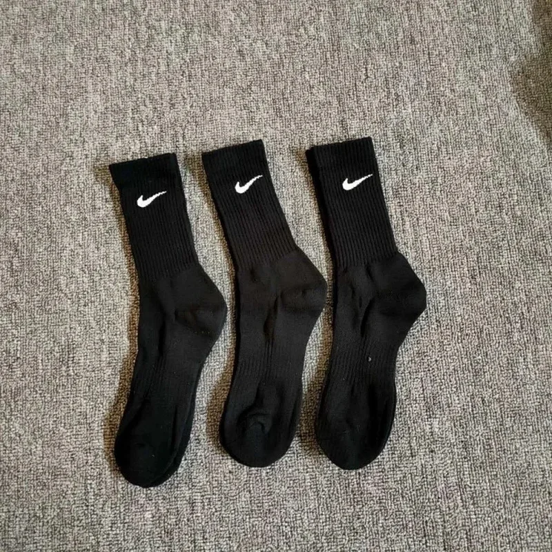 Three pairs of high-quality Nike long black socks